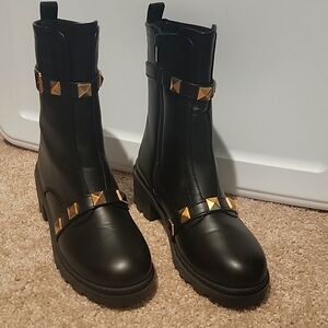 Fashion boots with studs. Looks designer. Worn once ,,runs big